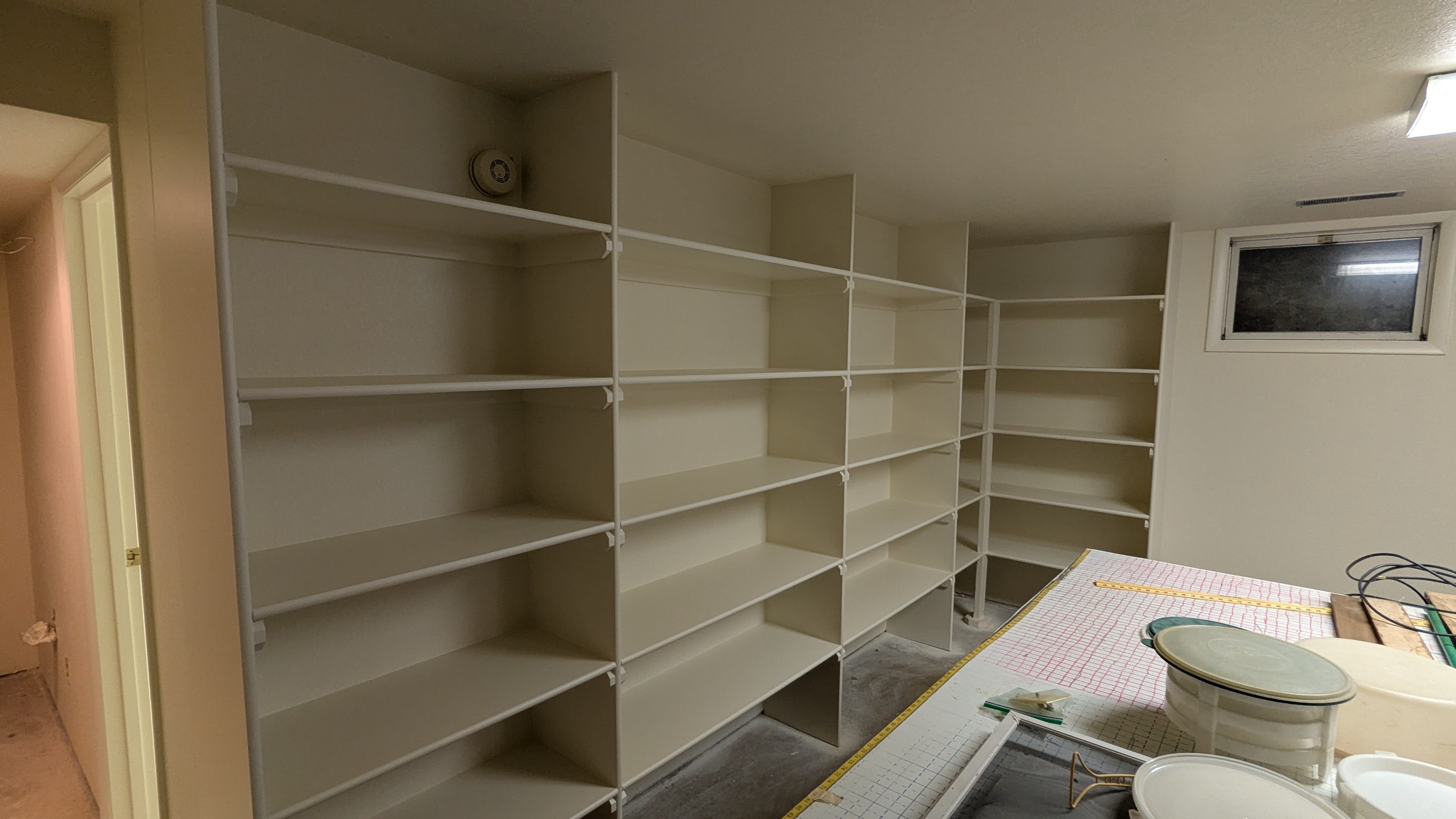 Finished specialty shelving and trim painting